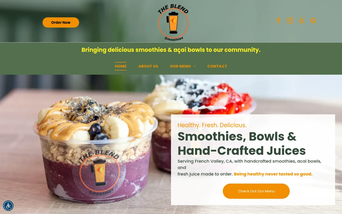The Blend Smoothies homepage on a laptop
